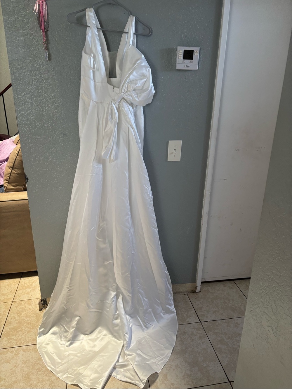 Elegant White Satin V-Neck Gown with Bow Detail